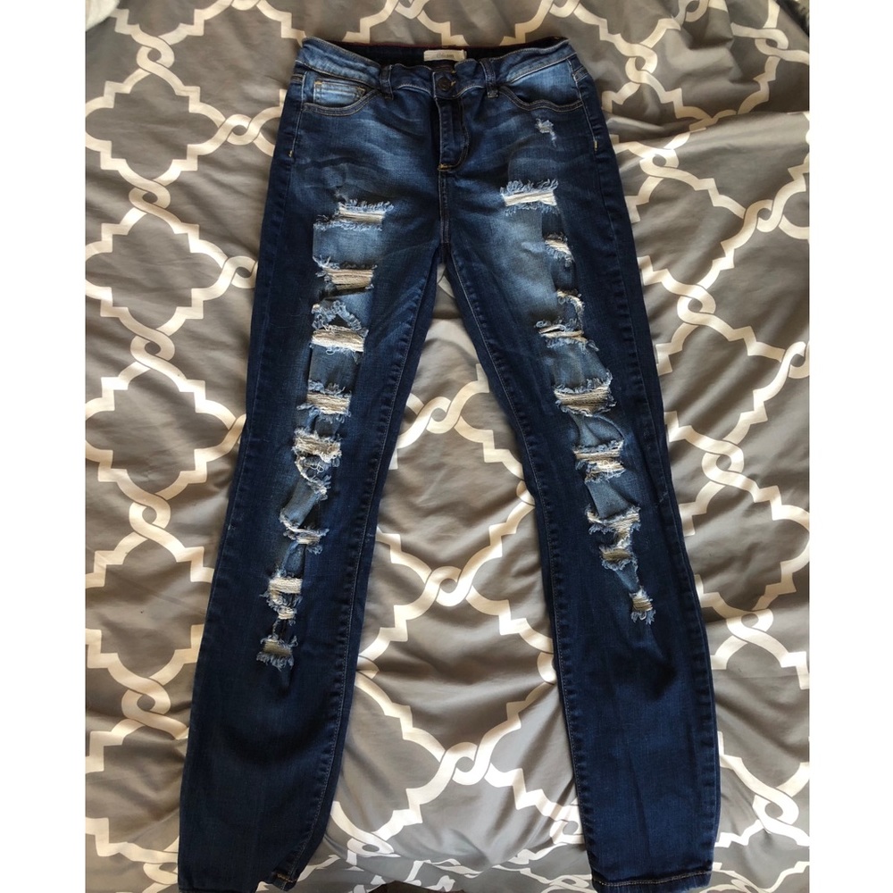 High-waisted distressed skinny jeans